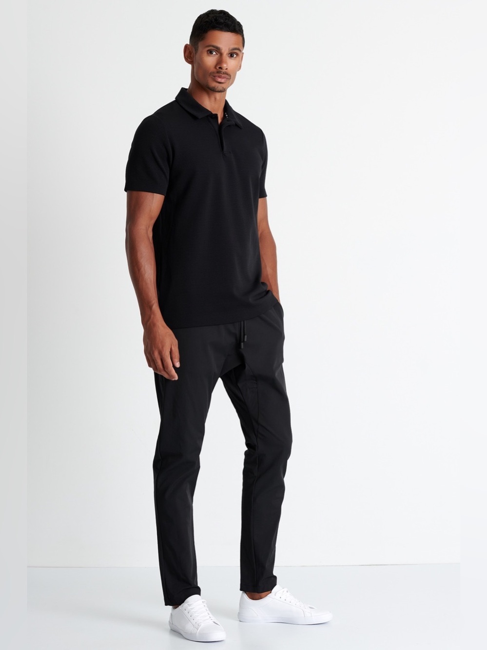 Shan Actuel Polo, black, BNWT, size L